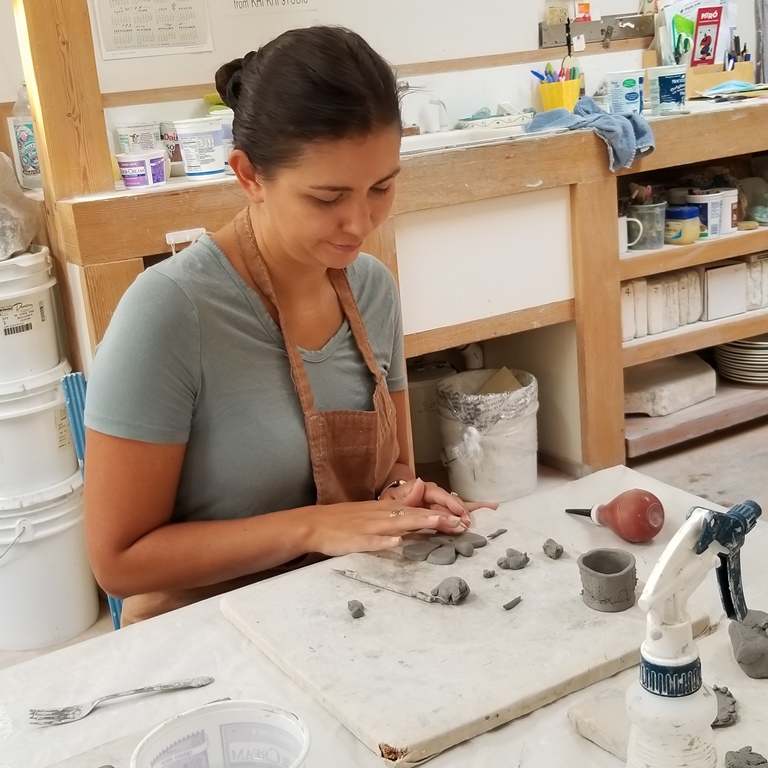 woman hand building with clay